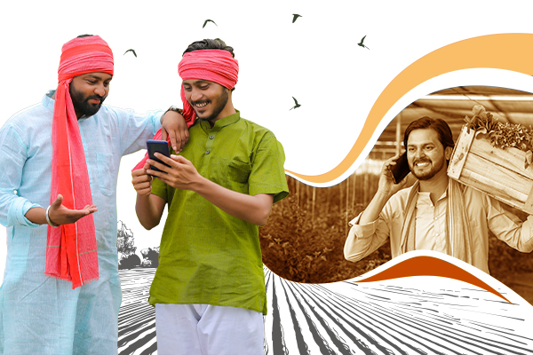 Two men in Indian attire examining a cellphone, representing the essence of rural marketing in India.